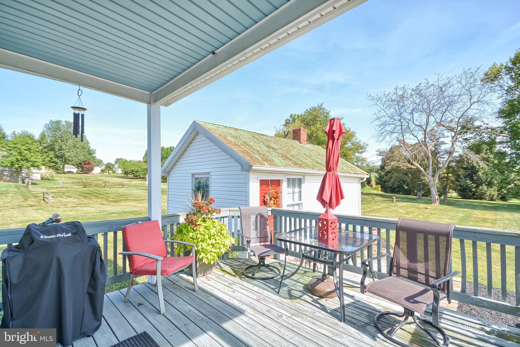 7229 Holter Road Middletown, MD 21769 - Photo 57 of 77 Rear deck overlooking Summer kitchen
