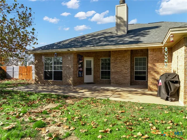 a view of a house with a patio