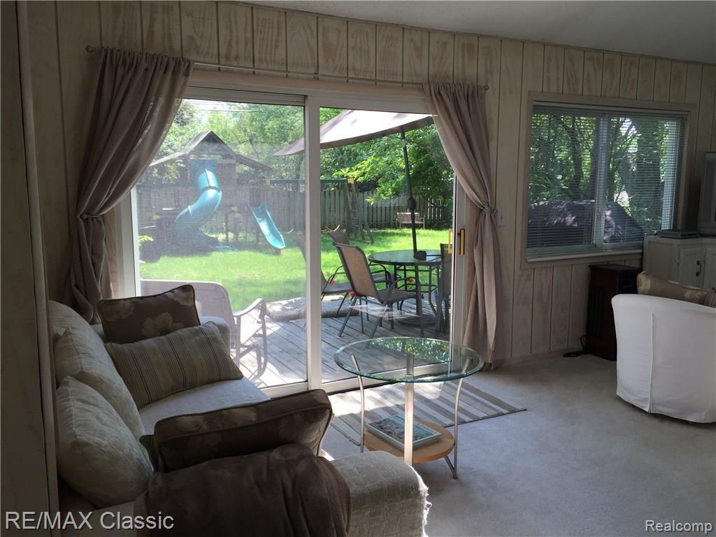 22415 Chestnut Tree Novi, MI 48375 - Photo 20 of 28 Chestnut Tree Florida room in to back yard.jpg