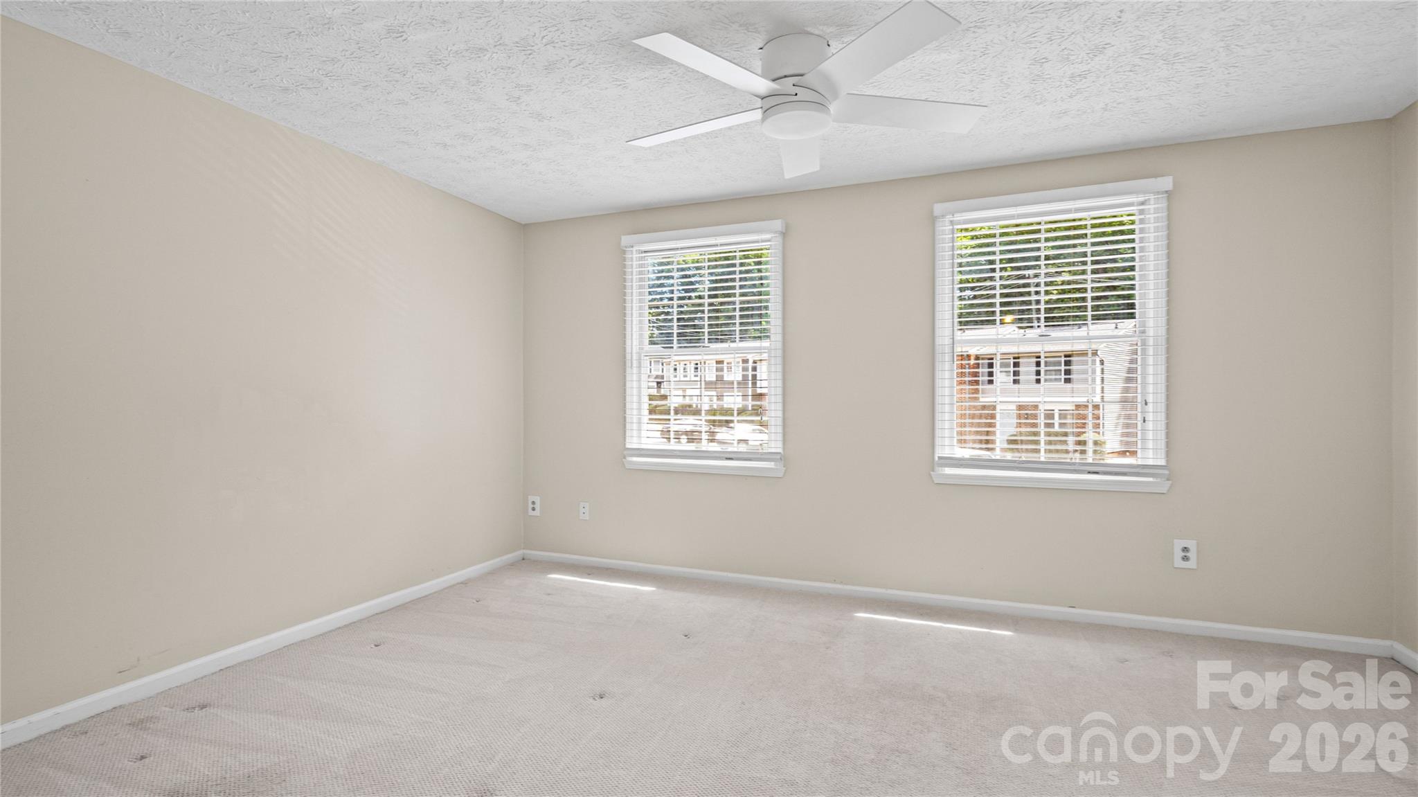 1231 Scaleybark Road Charlotte, NC 28209 - Photo 18 of 31 a view of an empty room with a window
