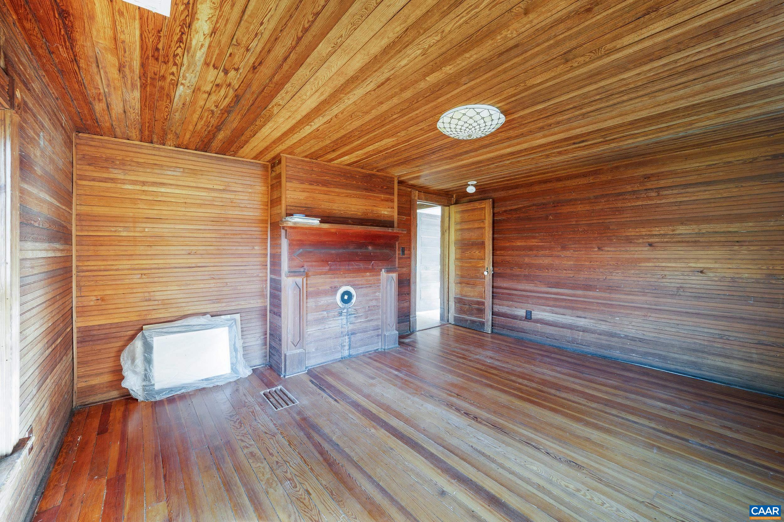 2728 East Branch Loop Roseland, VA 22967 - Photo 19 of 45 a view of empty room with wooden floor