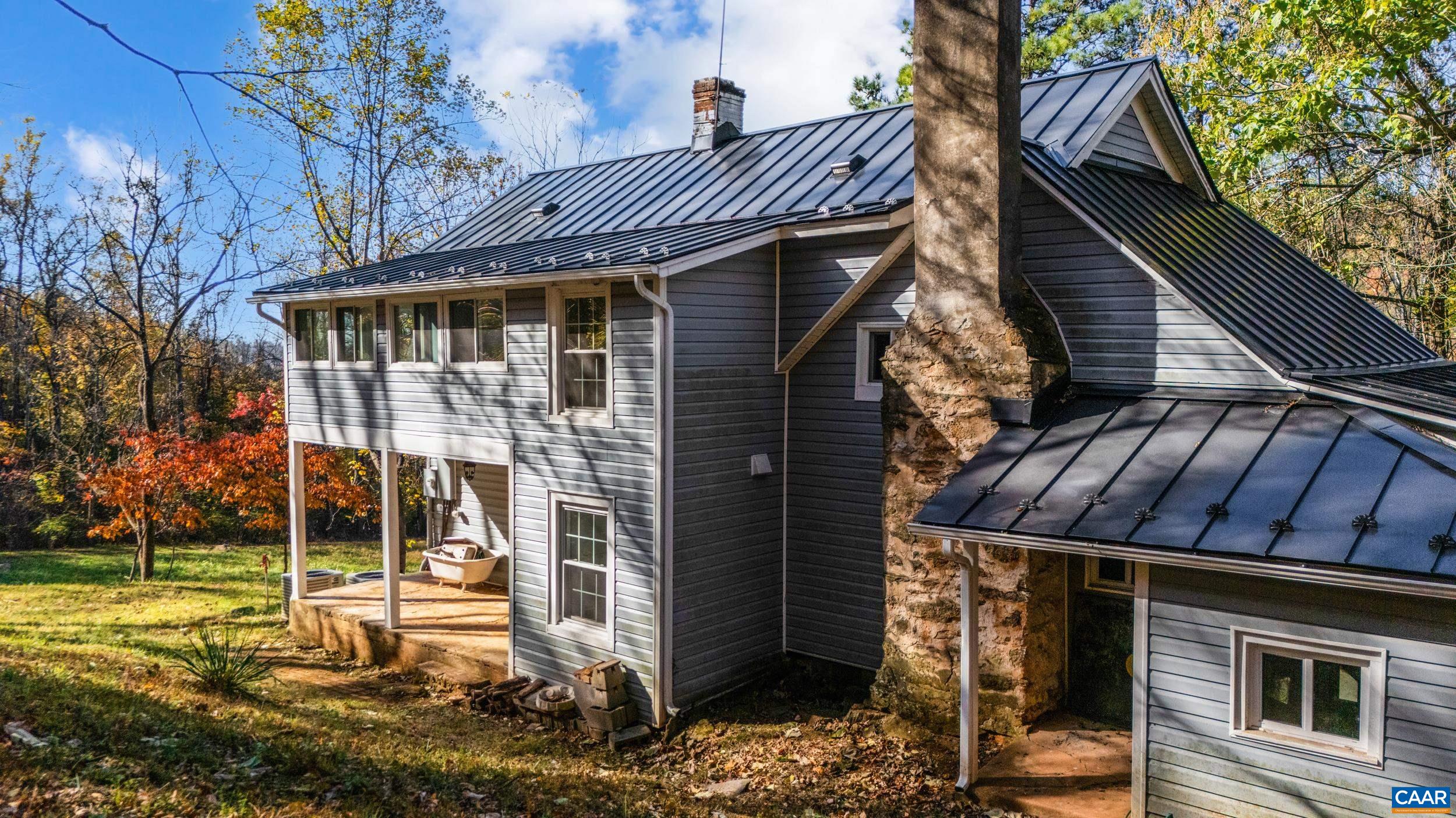 2728 East Branch Loop Roseland, VA 22967 - Photo 2 of 45 a front view of a house with a yard