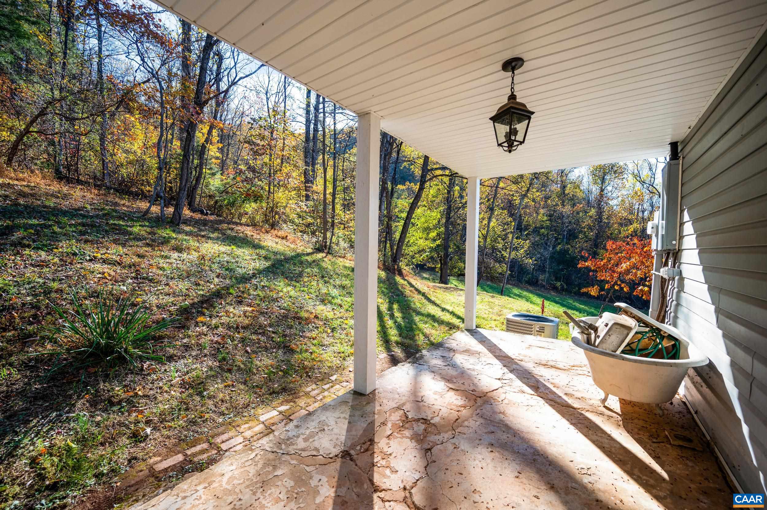 2728 East Branch Loop Roseland, VA 22967 - Photo 25 of 45 a view of a balcony with floor to ceiling windows and floor to ceiling window