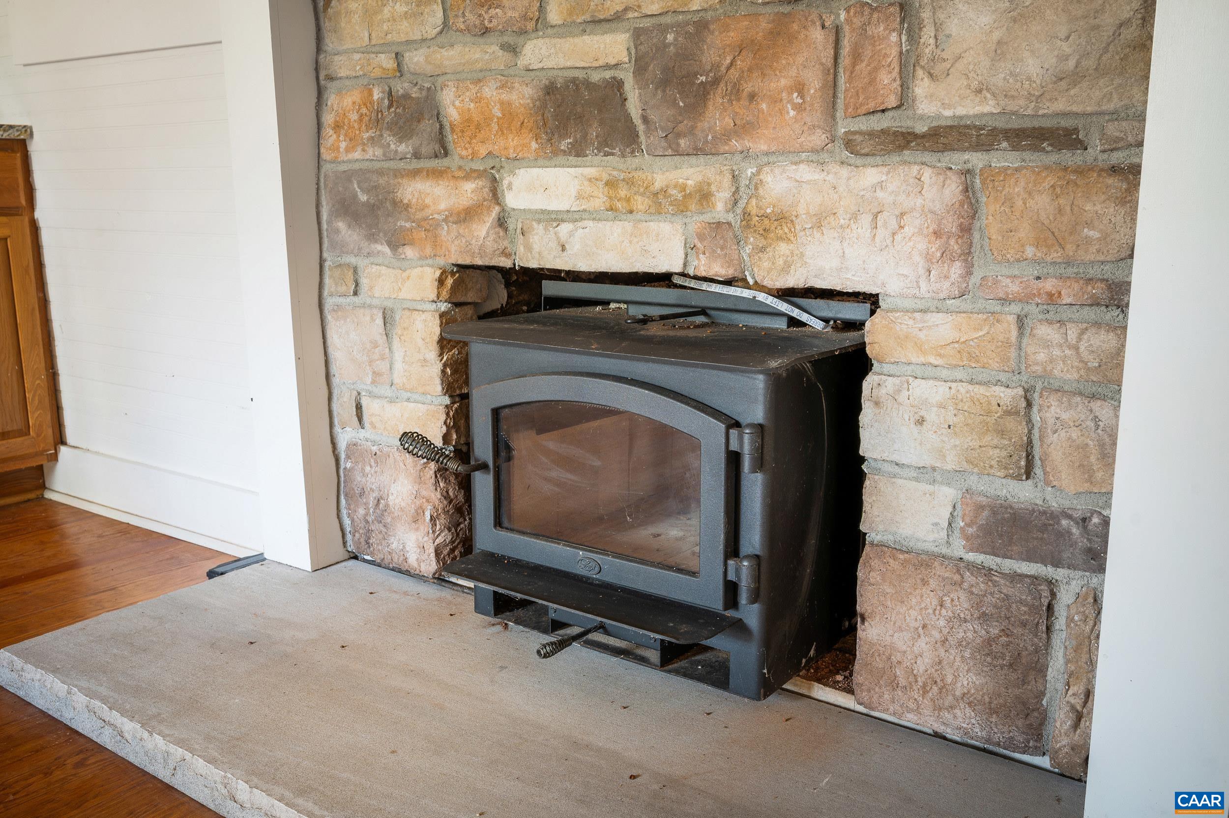 2728 East Branch Loop Roseland, VA 22967 - Photo 10 of 45 a stove top oven sitting inside of a kitchen