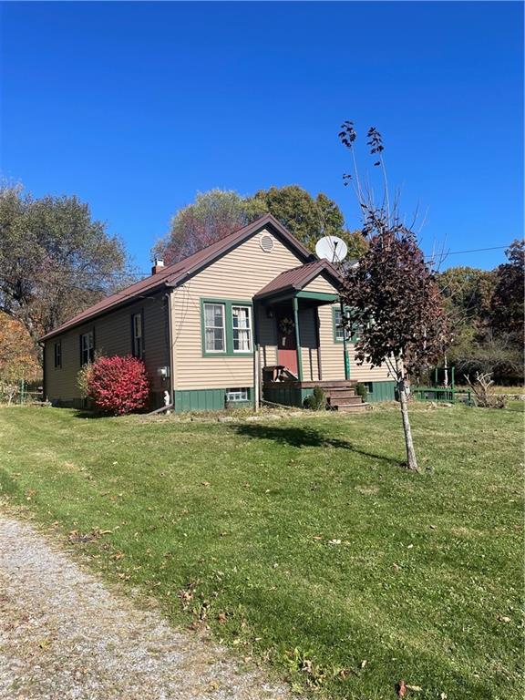 257 Boyers Road Harrisville, PA 16038 - Photo 3 of 4 a front view of a house with a yard