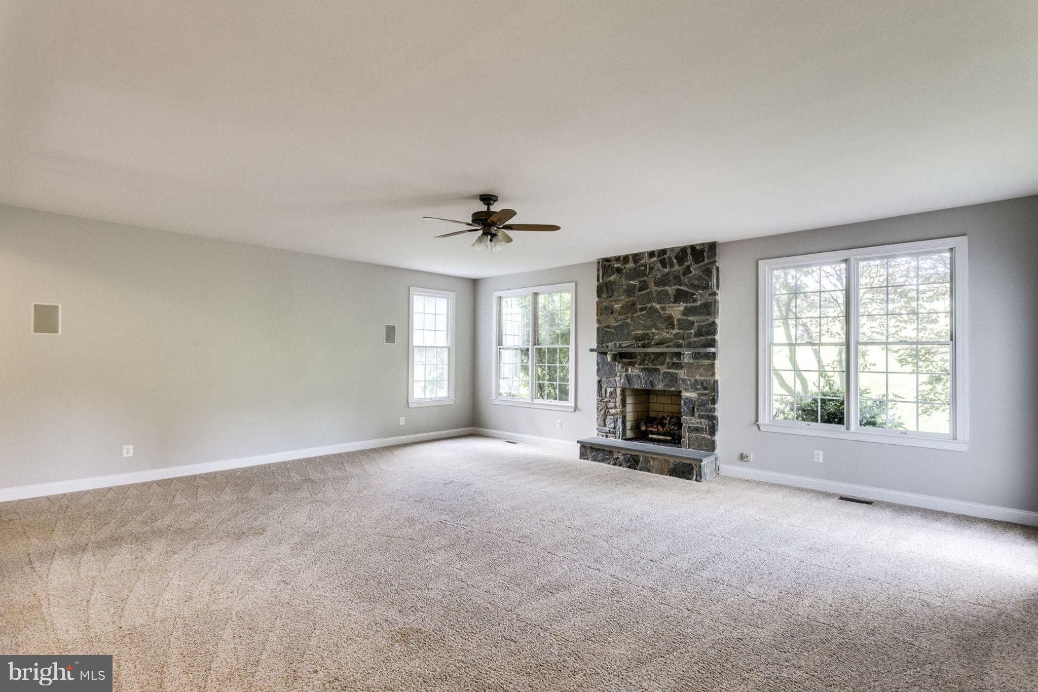 17559 Kinloch Ridge Court Leesburg, VA 20175 - Photo 11 of 30 Family Room with Stone Fireplace