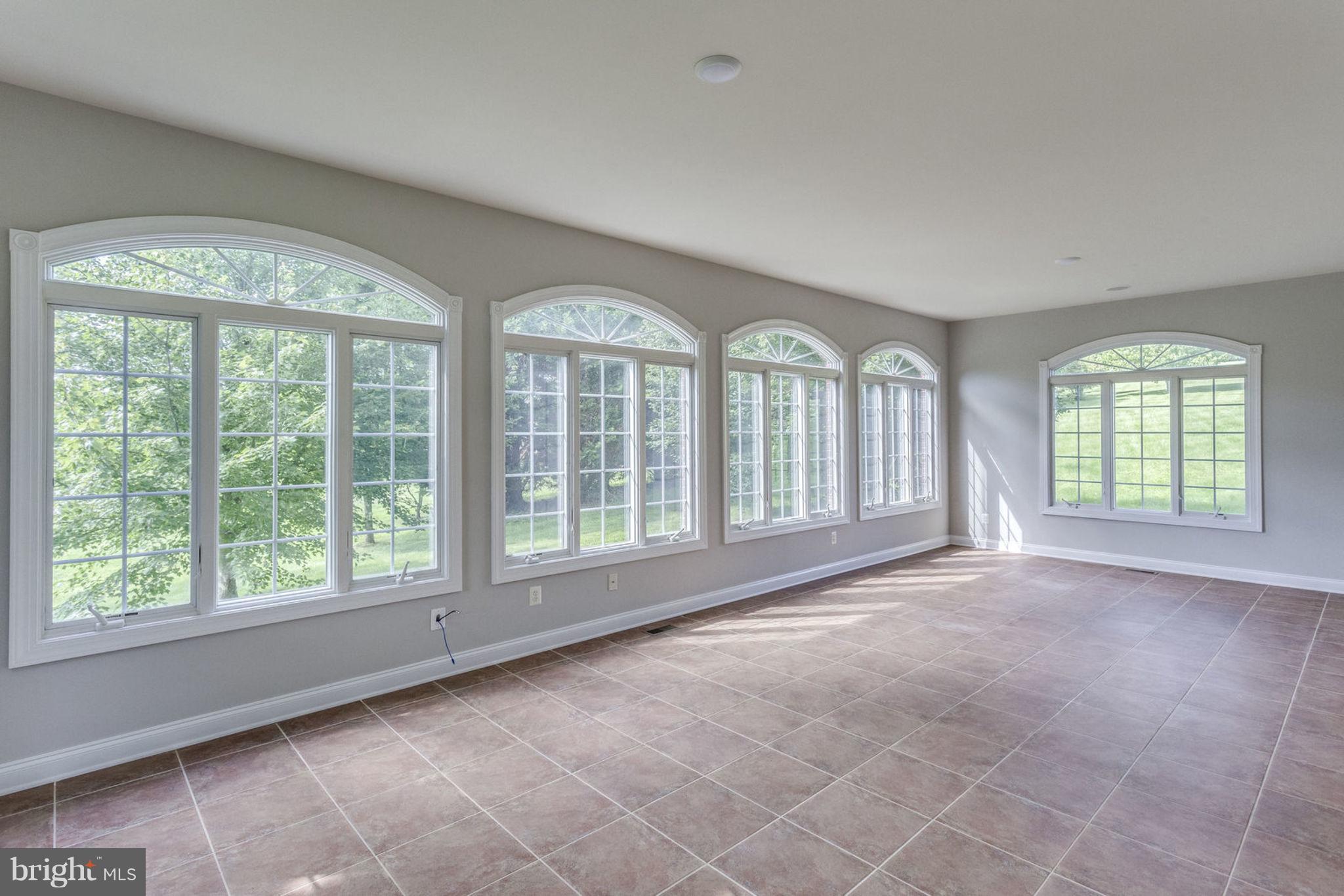 17559 Kinloch Ridge Court Leesburg, VA 20175 - Photo 9 of 30 Conservatory Lined with Windows