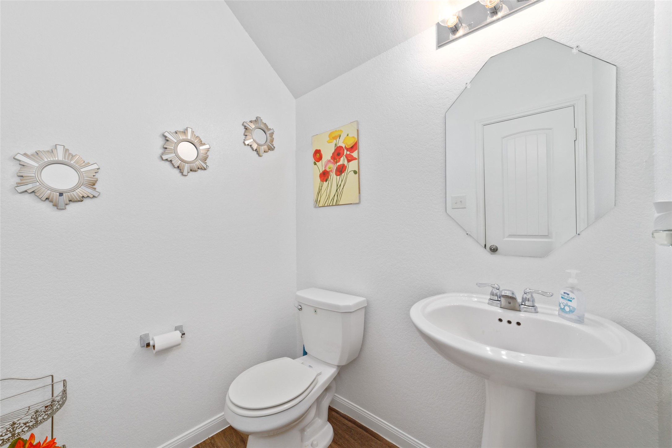 18619 Cooper Ravine Way Katy, TX 77449 - Photo 22 of 23 a bathroom with a sink mirror and toilet