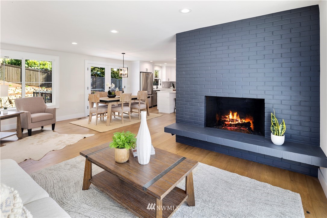 12106 Southeast 26th Street Bellevue, WA 98005 - Photo 13 of 32 a living room with furniture and a fireplace