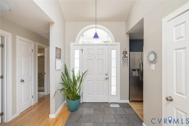 a view of entryway with wooden floor