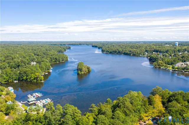 a view of a lake with a city