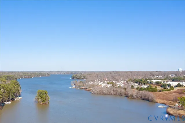 a view of a water fountain in front of the house