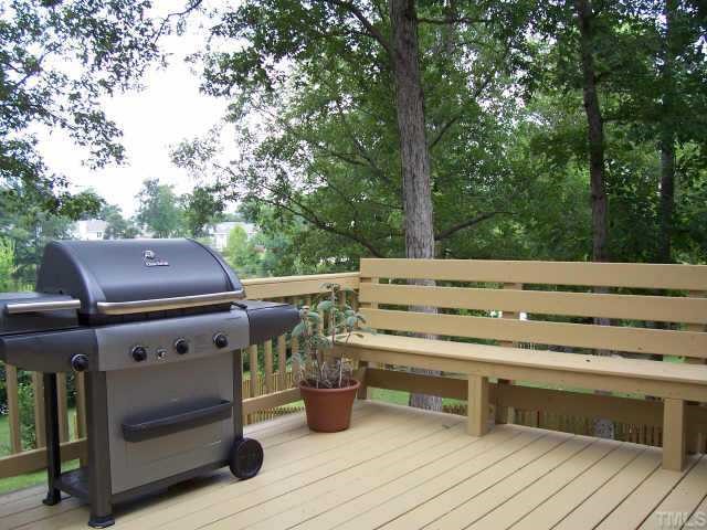 613 Thistlegate Trail Raleigh, NC 27610 - Photo 7 of 10 Deck directly off the Kitchen is great for Entertaining or just taking in the views!