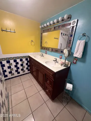 a bathroom with a mirror