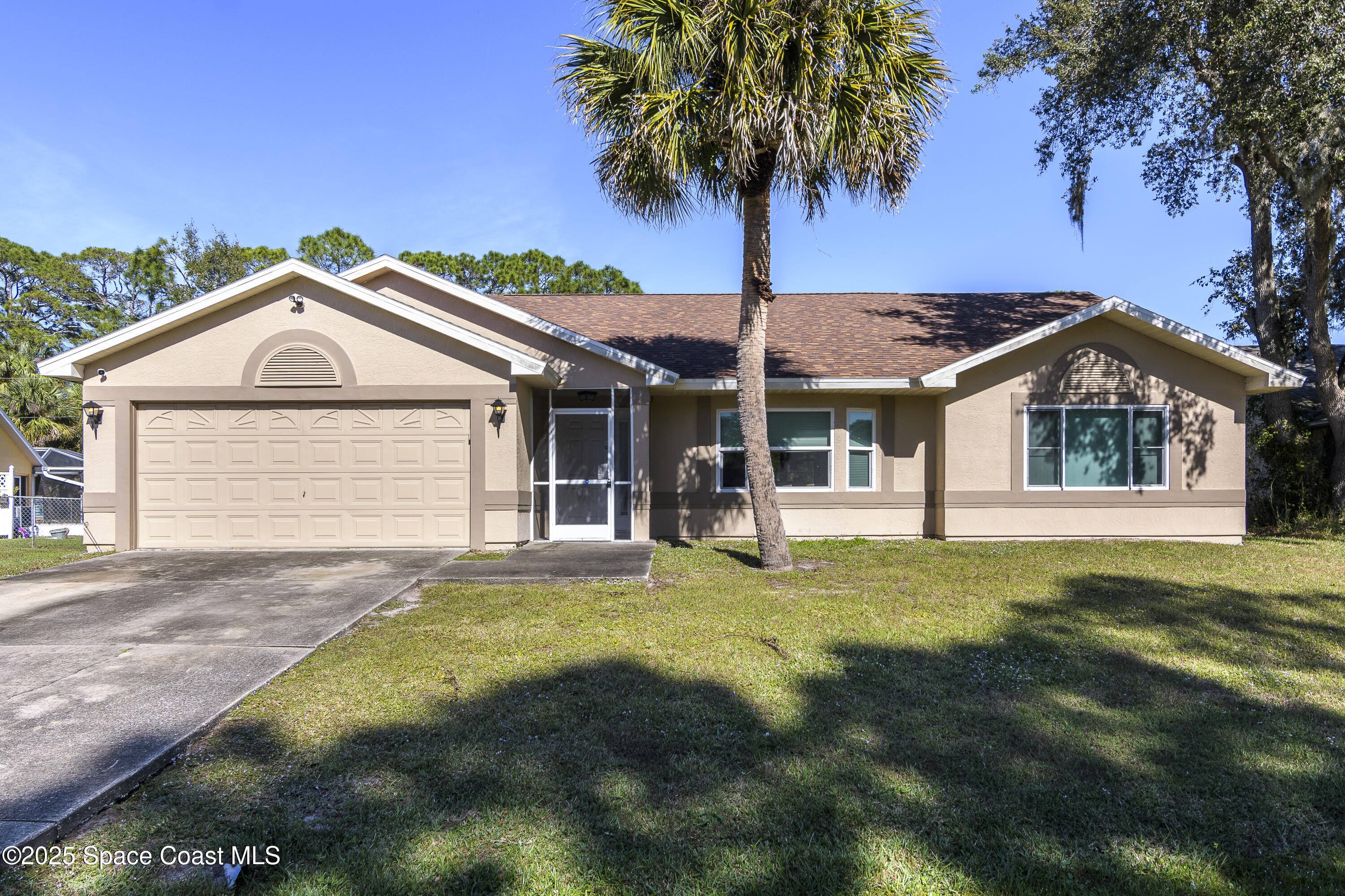 413 Abello Road Southeast Palm Bay, FL 32909 - Photo 1 of 28 Front of House