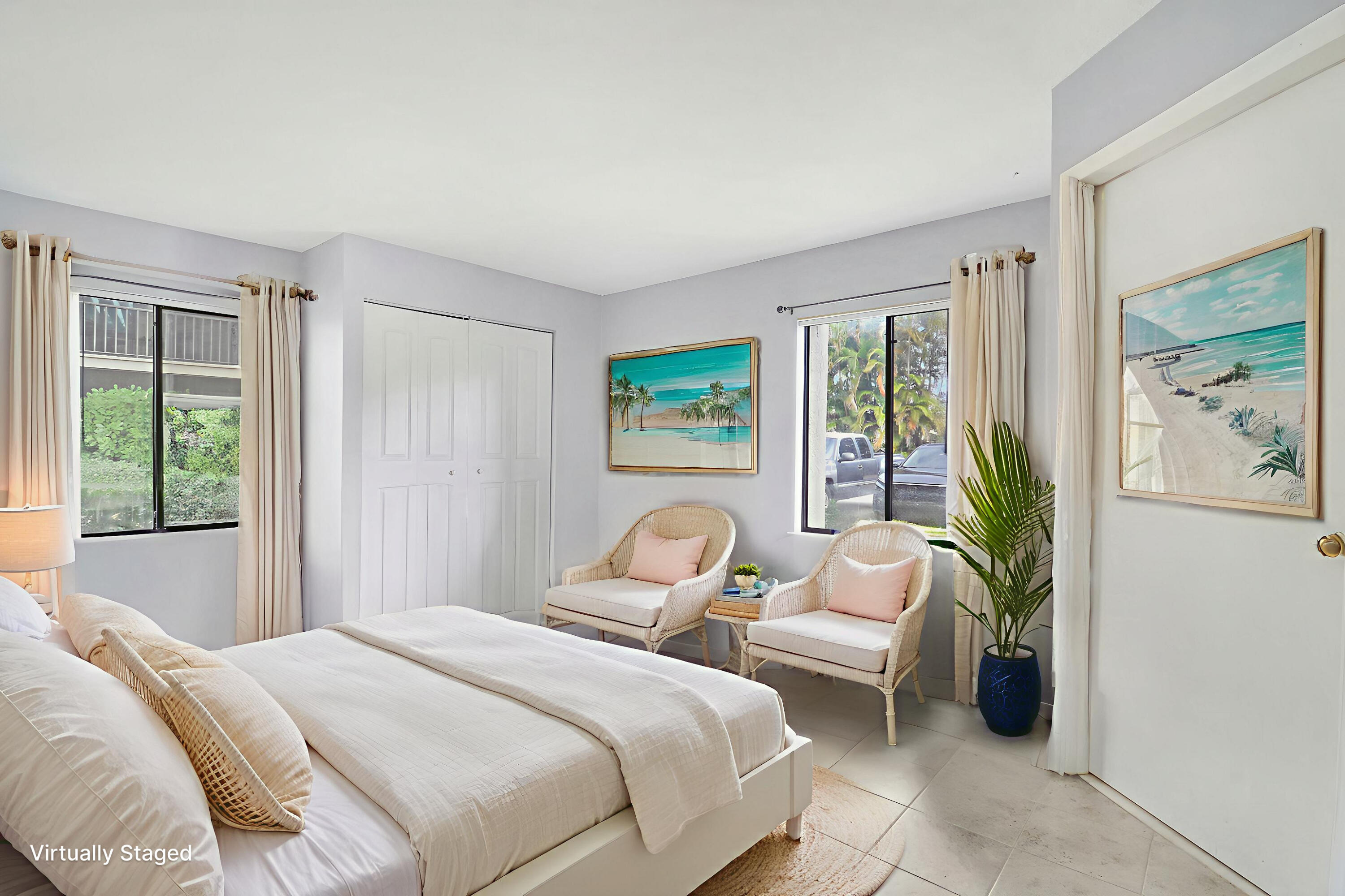 150 Pineview Road, Unit C4 Jupiter, FL 33469 - Photo 12 of 18 a bedroom with a bed and a large window