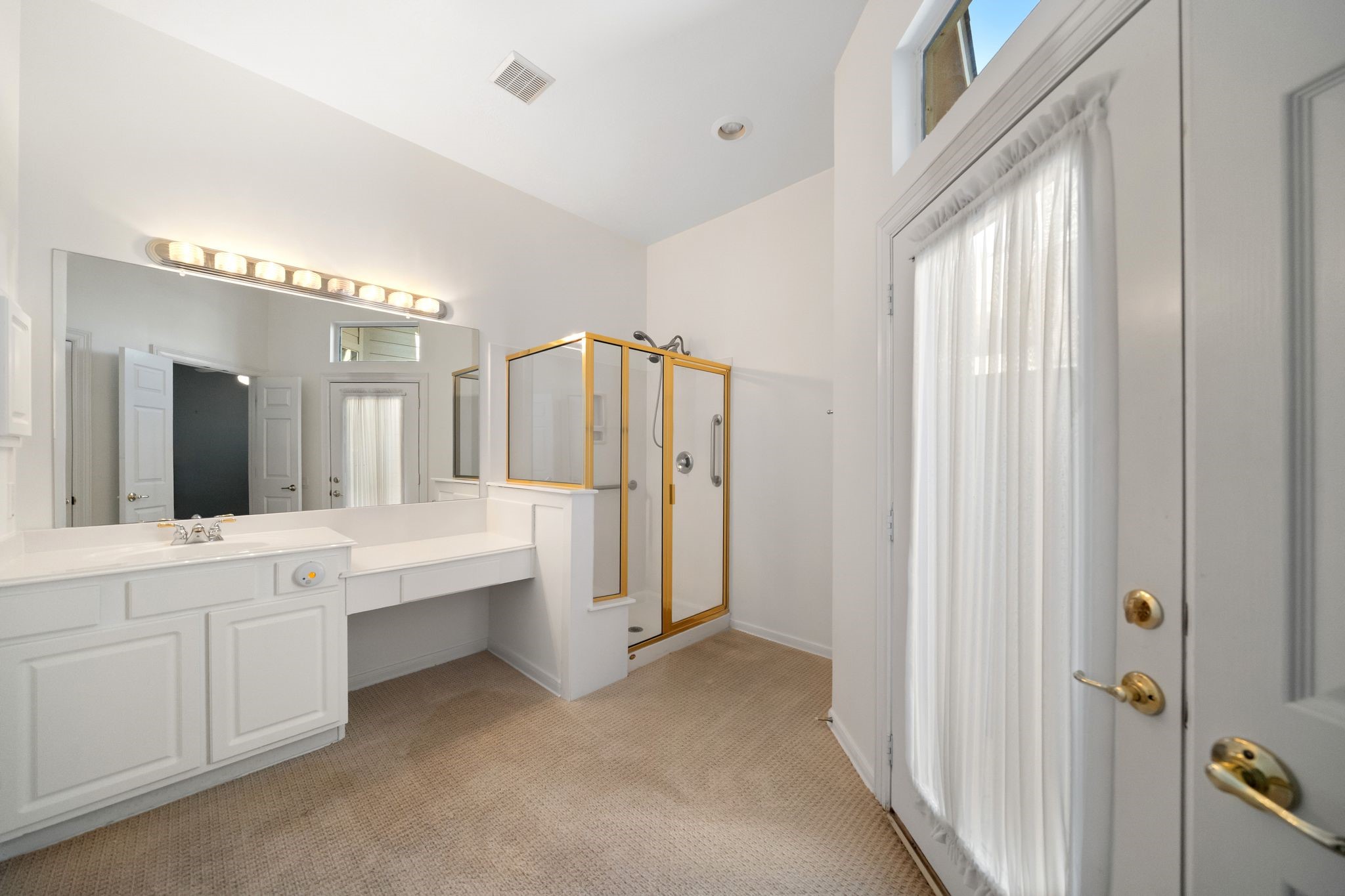 7 Sovereign Way Conroe, TX 77384 - Photo 15 of 31 a large bathroom with a double vanity sink mirror and shower