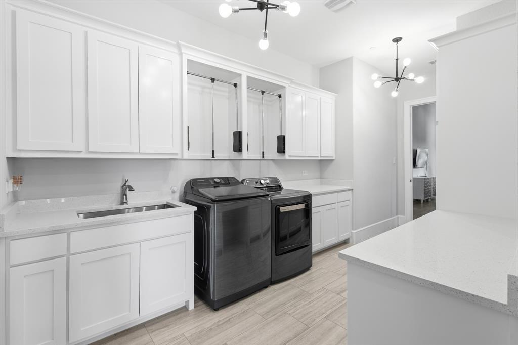 1285 Rimrock Drive Lucas, TX 75002 - Photo 20 of 37 a kitchen with stainless steel appliances granite countertop a sink stove and refrigerator