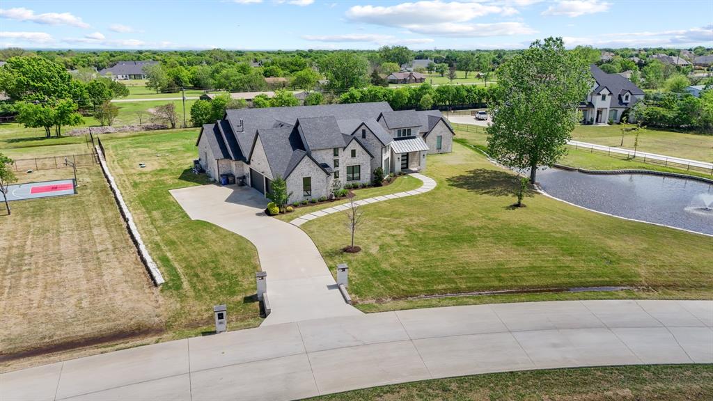 1285 Rimrock Drive Lucas, TX 75002 - Photo 2 of 37 a view of a swimming pool with a patio
