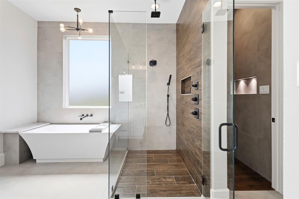 1285 Rimrock Drive Lucas, TX 75002 - Photo 24 of 37 a bathroom with a bathtub and a shower