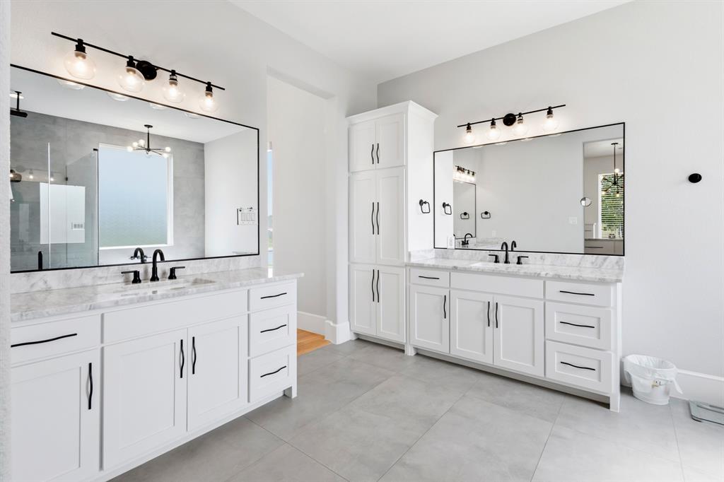 1285 Rimrock Drive Lucas, TX 75002 - Photo 25 of 37 a bathroom with a double vanity sink mirror and