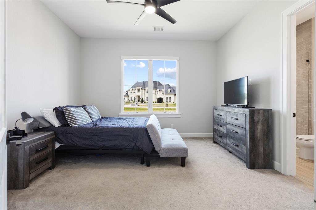 1285 Rimrock Drive Lucas, TX 75002 - Photo 30 of 37 a living room with furniture and a flat screen tv
