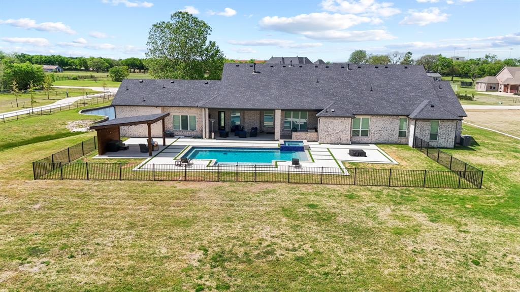 1285 Rimrock Drive Lucas, TX 75002 - Photo 31 of 37 a view of a house with pool and a yard