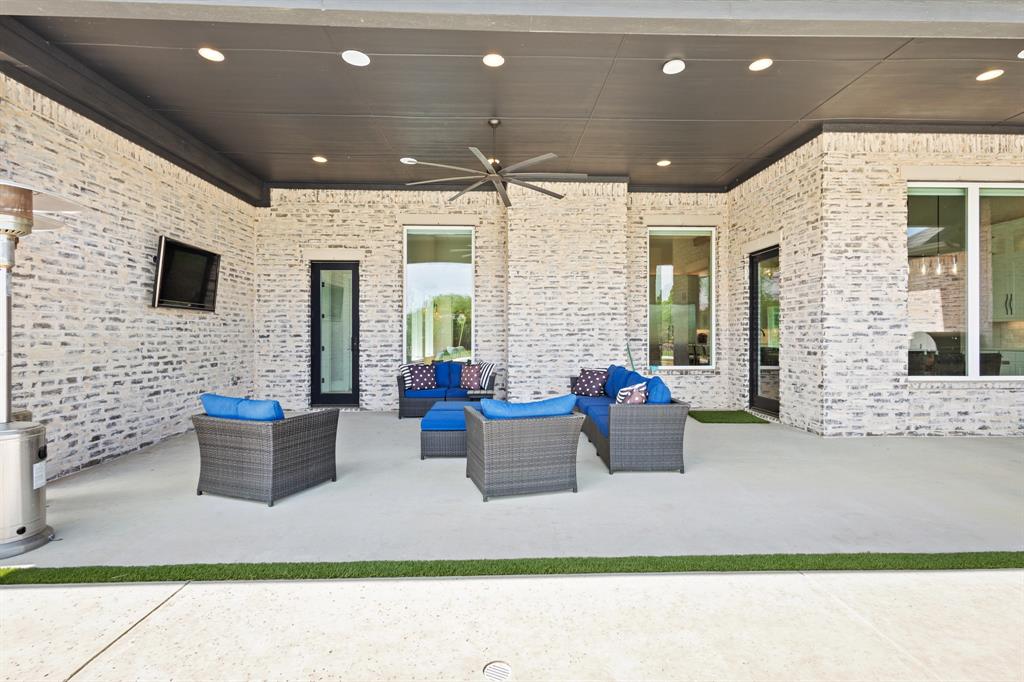1285 Rimrock Drive Lucas, TX 75002 - Photo 37 of 37 a living room with furniture and flat screen tv