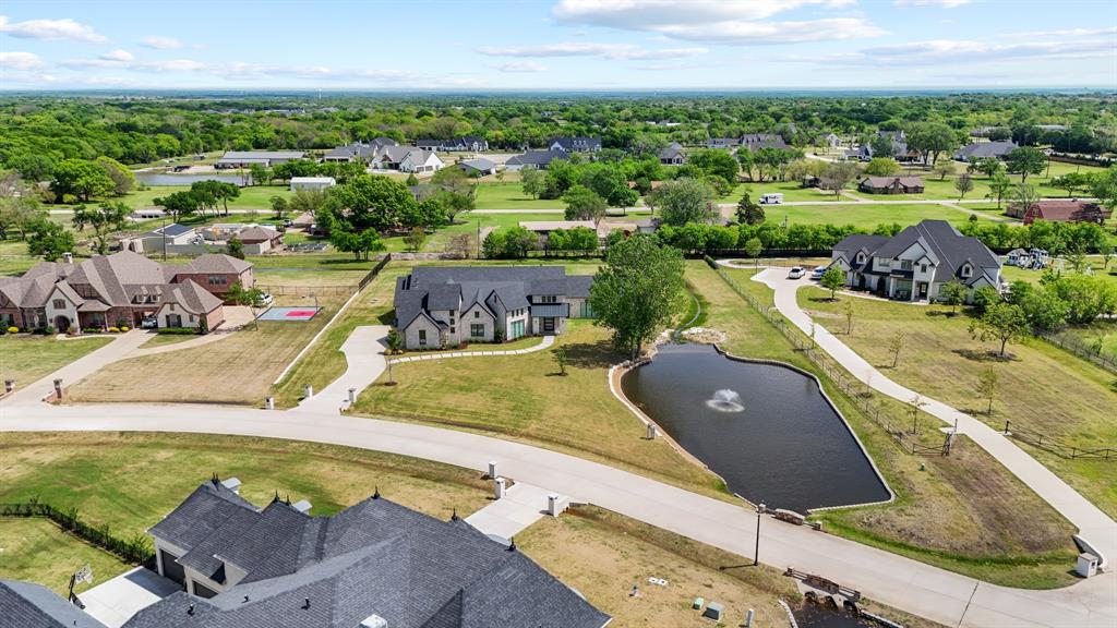 1285 Rimrock Drive Lucas, TX 75002 - Photo 5 of 37 an aerial view of a house with a swimming pool
