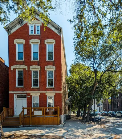 a view of a building with a street