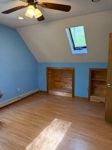 30 Groton Road Shirley, MA 01464 - Photo 14 of 25 a view of an empty room with wooden floor and a window