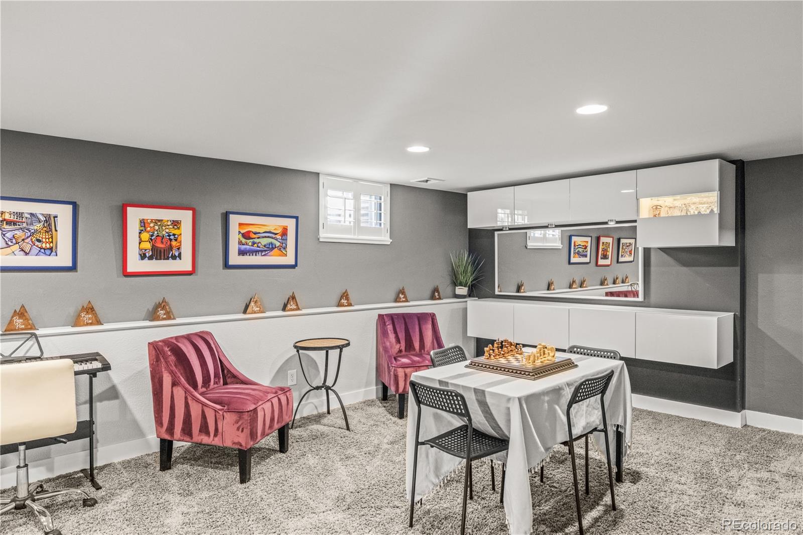 7005 West 44th Avenue Wheat Ridge, CO 80033 - Photo 23 of 37 a view of a dining room with furniture