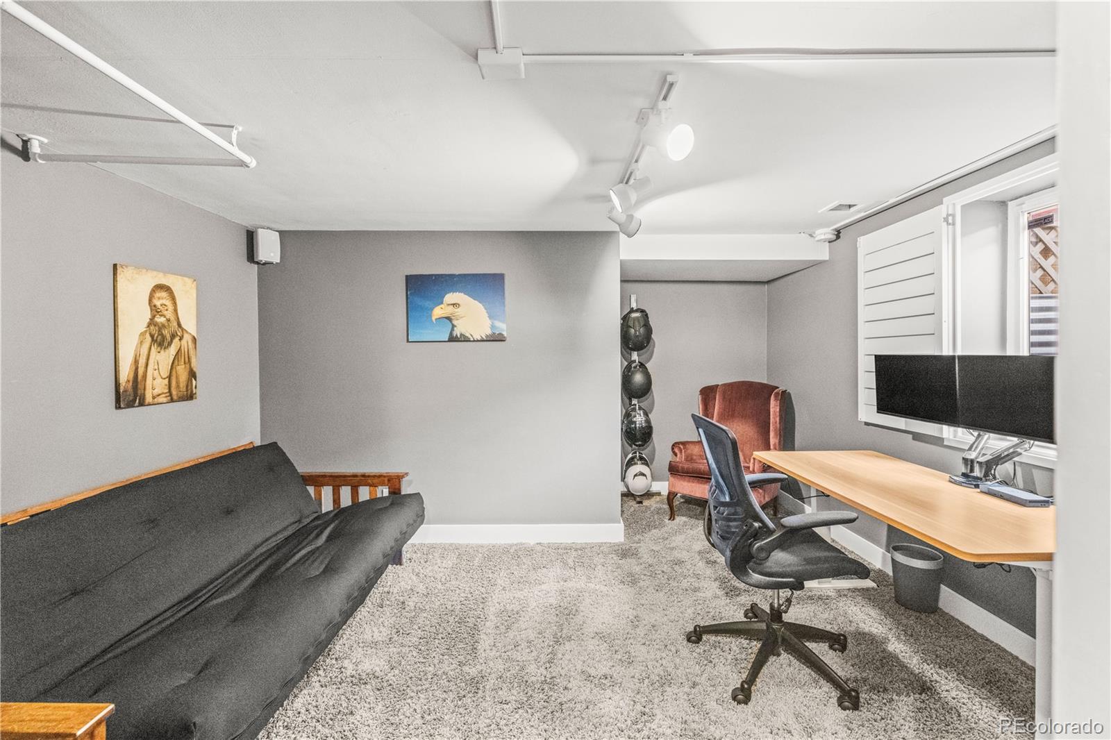 7005 West 44th Avenue Wheat Ridge, CO 80033 - Photo 28 of 37 a view of a workspace with furniture and a window