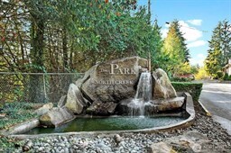 20318 Bothell Everett Highway, Unit A204 Bothell, WA 98012 - Photo 3 of 35 a view of a slide in a backyard