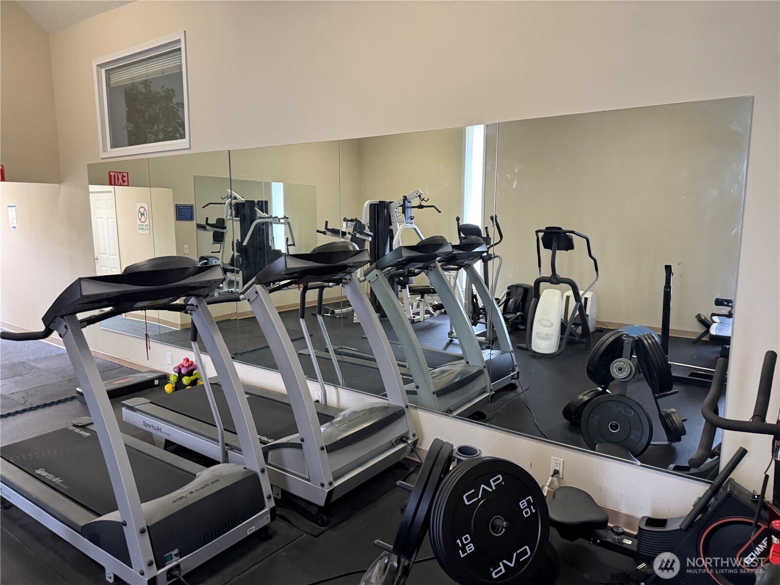 20318 Bothell Everett Highway, Unit A204 Bothell, WA 98012 - Photo 33 of 35 a view of a room with gym equipment
