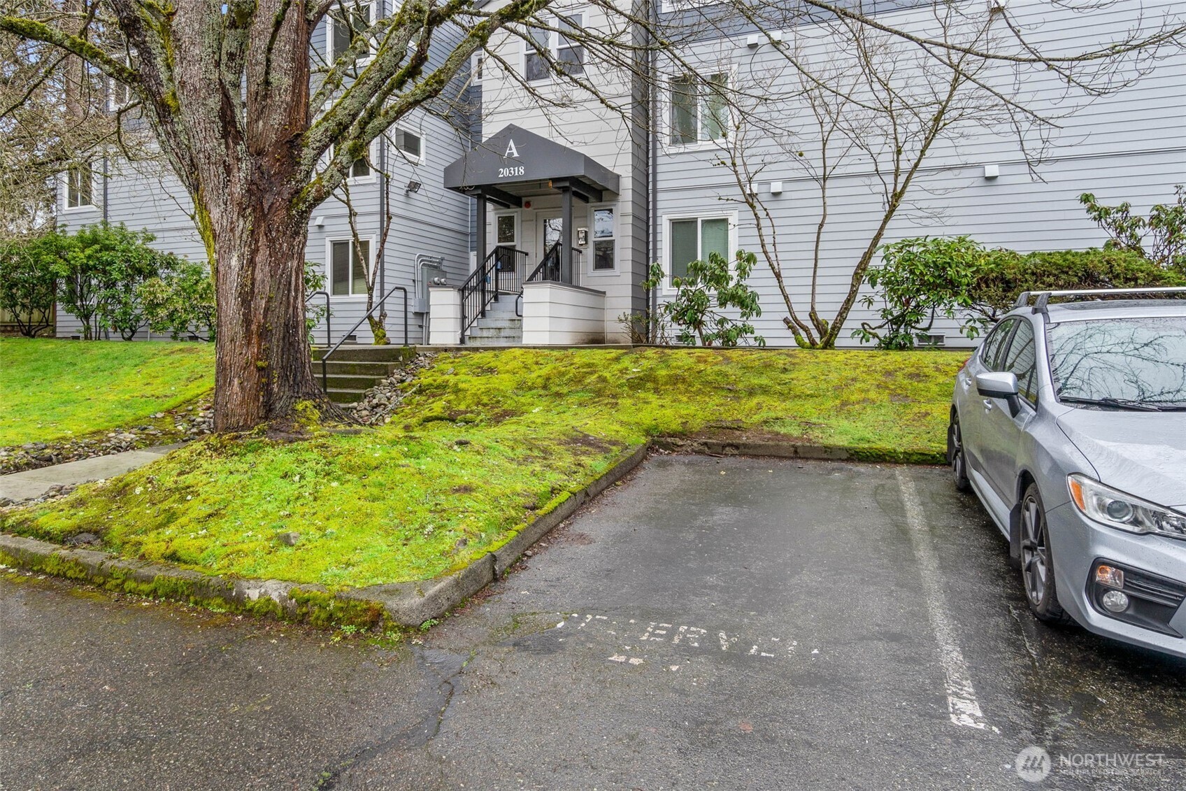 20318 Bothell Everett Highway, Unit A204 Bothell, WA 98012 - Photo 5 of 35 a view of outdoor space yard and patio