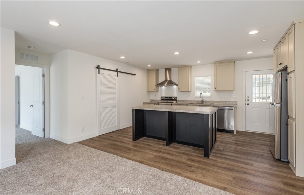 13435 Mesquite Road Whitewater, CA 92282 - Photo 12 of 29 a kitchen with a refrigerator and a sink