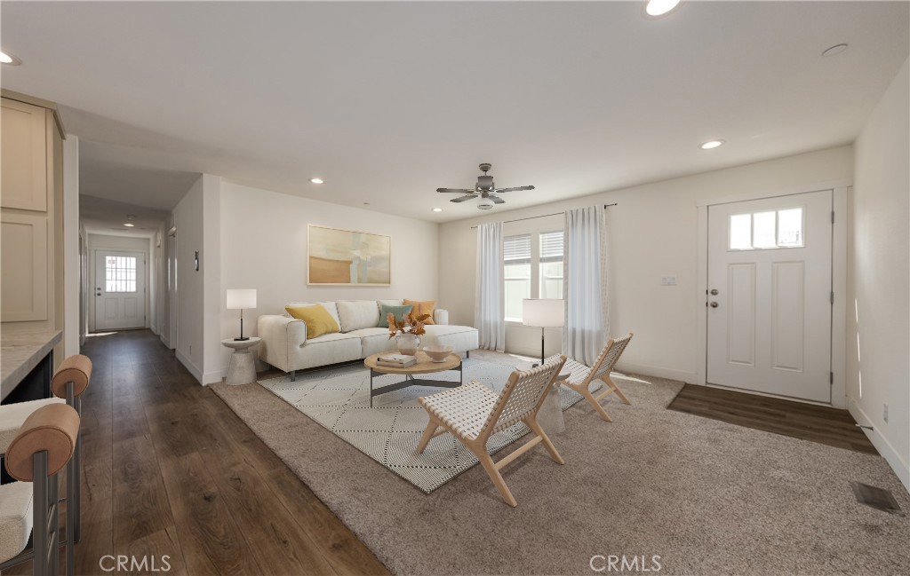 13435 Mesquite Road Whitewater, CA 92282 - Photo 13 of 29 a living room with furniture and wooden floor