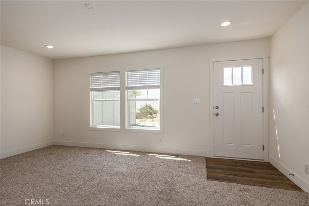 13435 Mesquite Road Whitewater, CA 92282 - Photo 16 of 29 an empty room with windows
