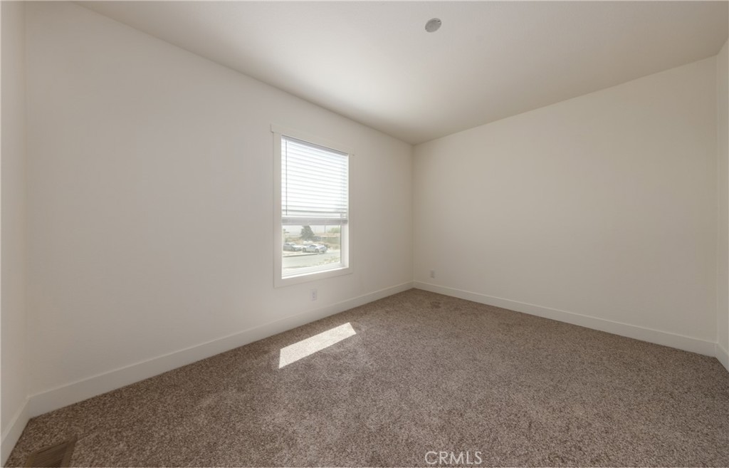 13435 Mesquite Road Whitewater, CA 92282 - Photo 18 of 29 an empty room with a window