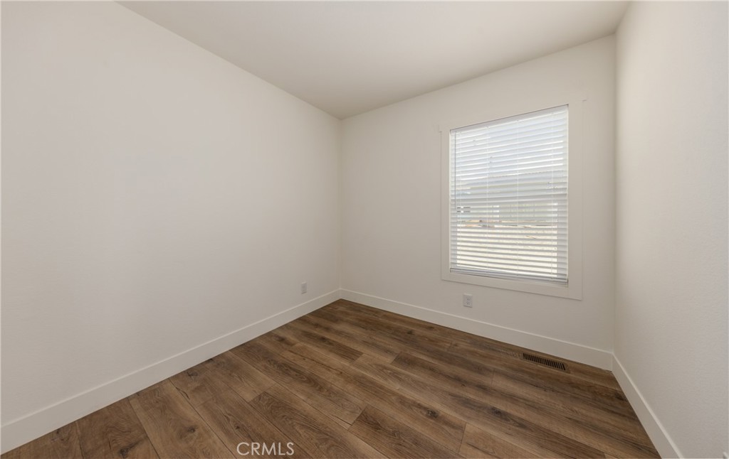 13435 Mesquite Road Whitewater, CA 92282 - Photo 19 of 29 an empty room with a window