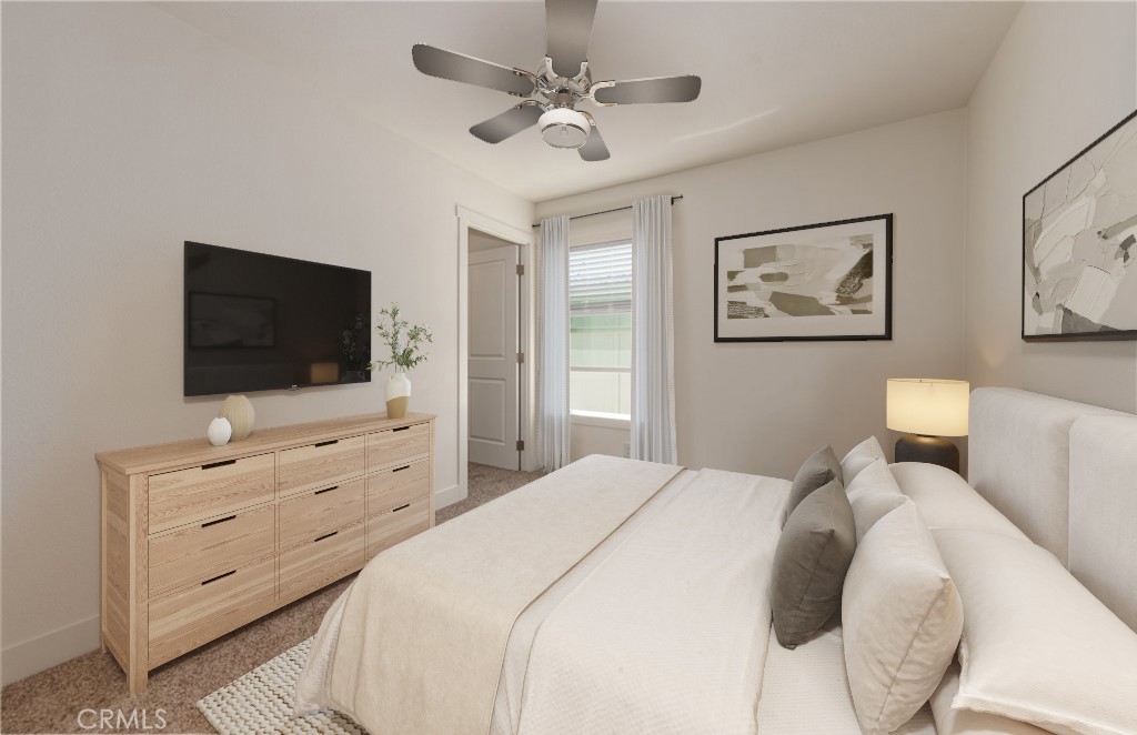 13435 Mesquite Road Whitewater, CA 92282 - Photo 26 of 29 a bedroom with a bed and a flat screen tv