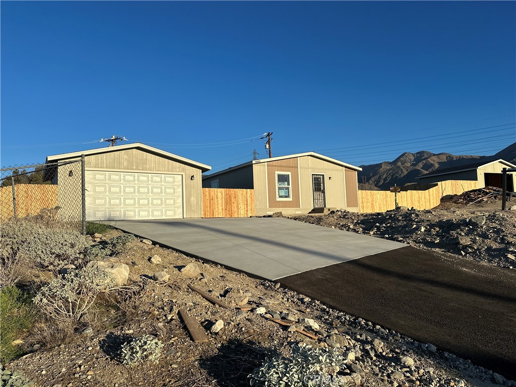 13435 Mesquite Road Whitewater, CA 92282 - Photo 6 of 29 a view of a house with a yard