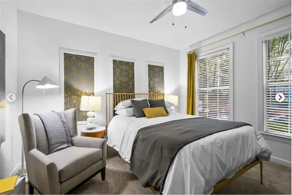 a black and white photo of a living room