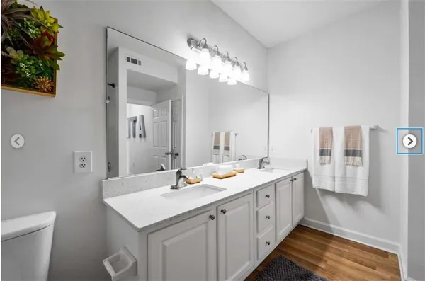 a outdoor living space with furniture and a potted plant