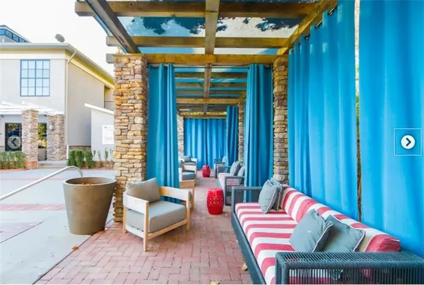 a room with furniture pool table and table