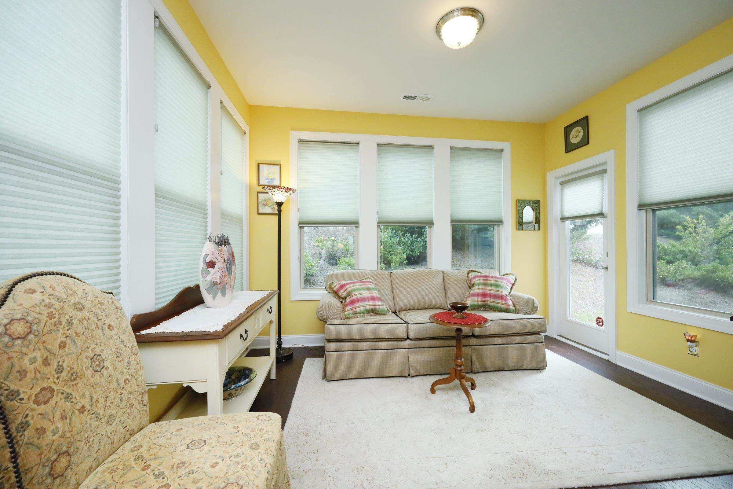 1241 Catch Fly Lane Durham, NC 27713 - Photo 15 of 44 a living room with furniture and a potted plant