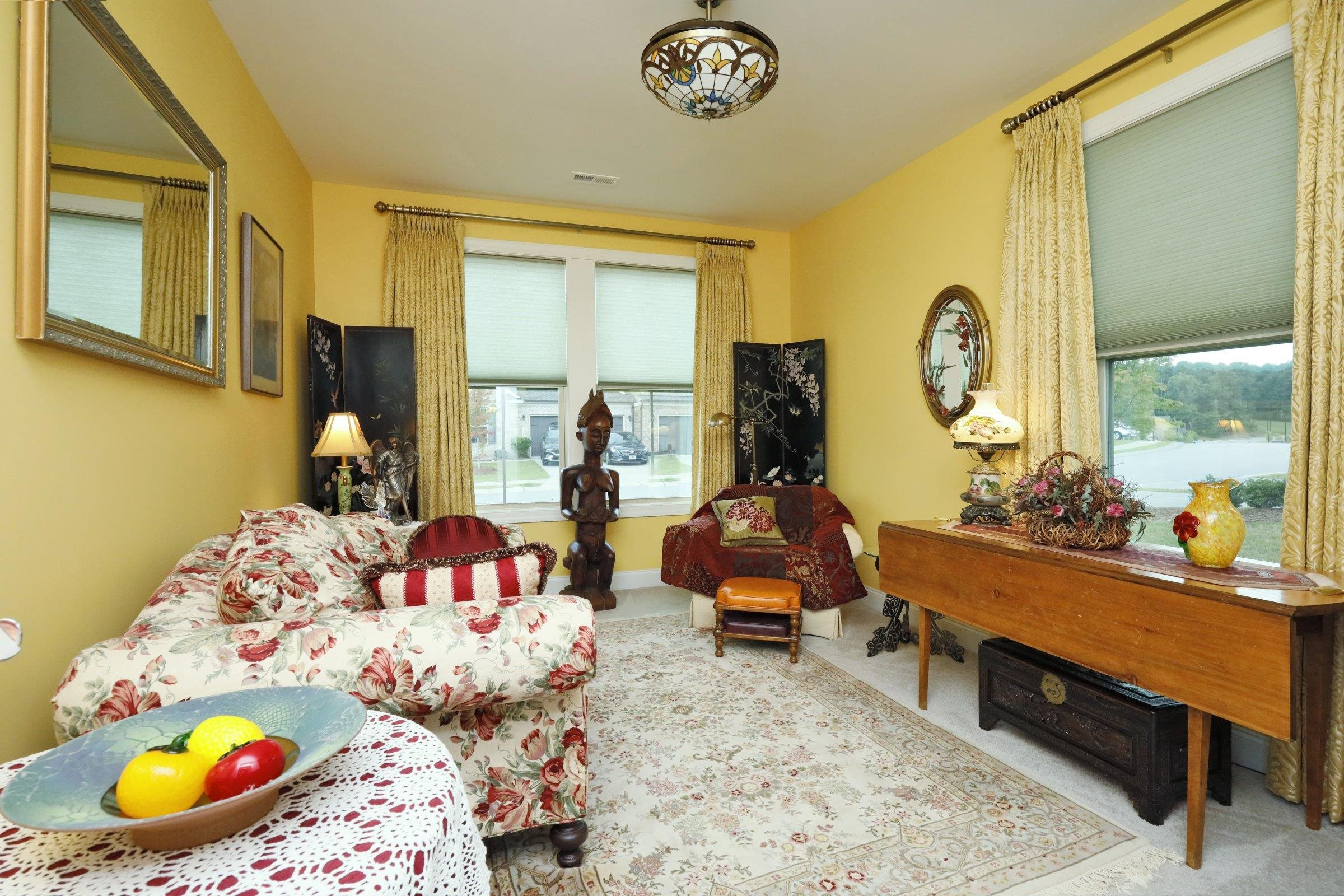 1241 Catch Fly Lane Durham, NC 27713 - Photo 19 of 44 a bed room with furniture and a mirror