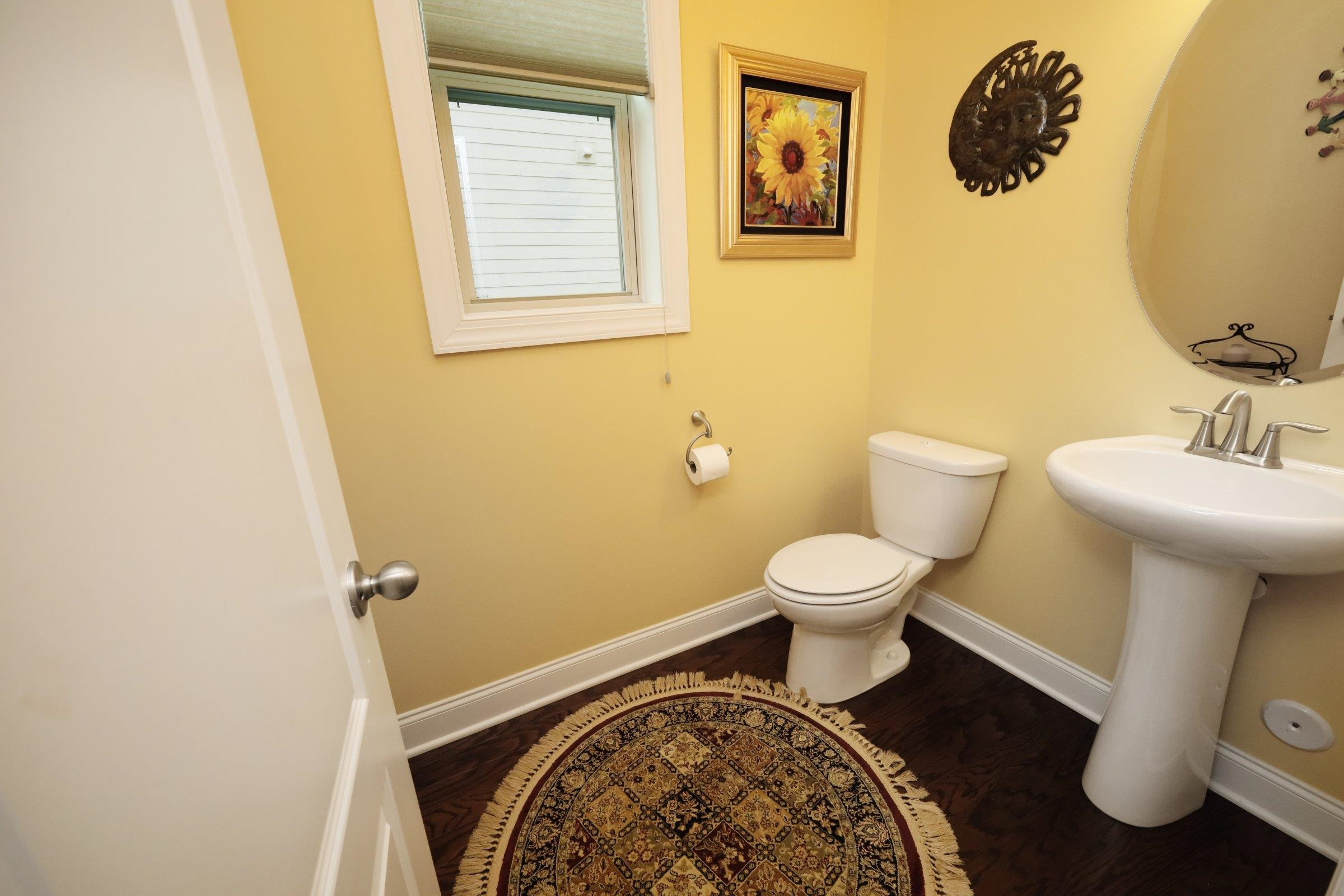 1241 Catch Fly Lane Durham, NC 27713 - Photo 22 of 44 a bathroom with a toilet and a mirror