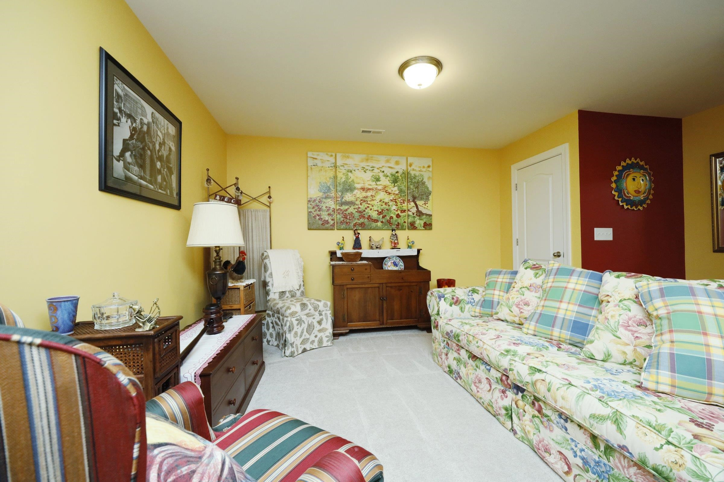 1241 Catch Fly Lane Durham, NC 27713 - Photo 29 of 44 a bedroom with a bed and a couch